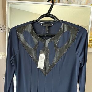 BCBGMAXAZRIA’s XXS (0-2) above the knee, longsleeve dress with a leather details